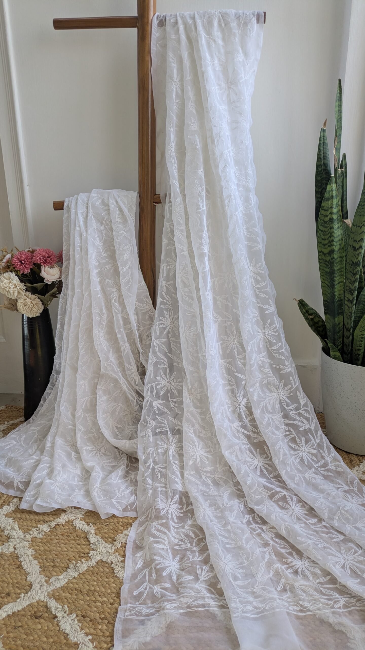 "Bela" white georgette chikankari saree with tepchi work